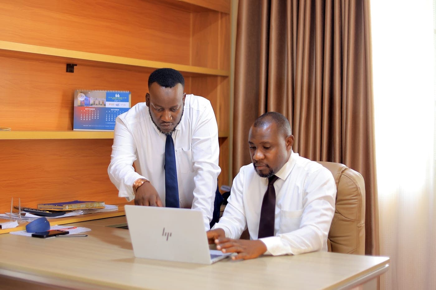Wamato Estates team reviewing a client's property remotely
